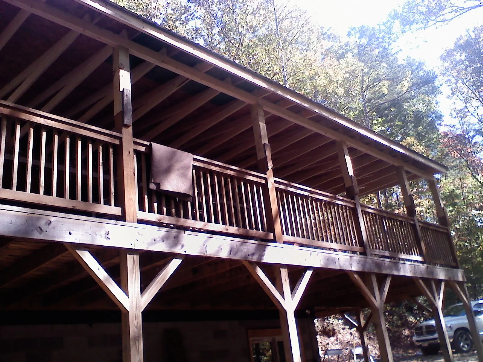 Timber framing under a new elevated porch and deck — Roof Leak Repair in Wheaton by Roofing Brothers